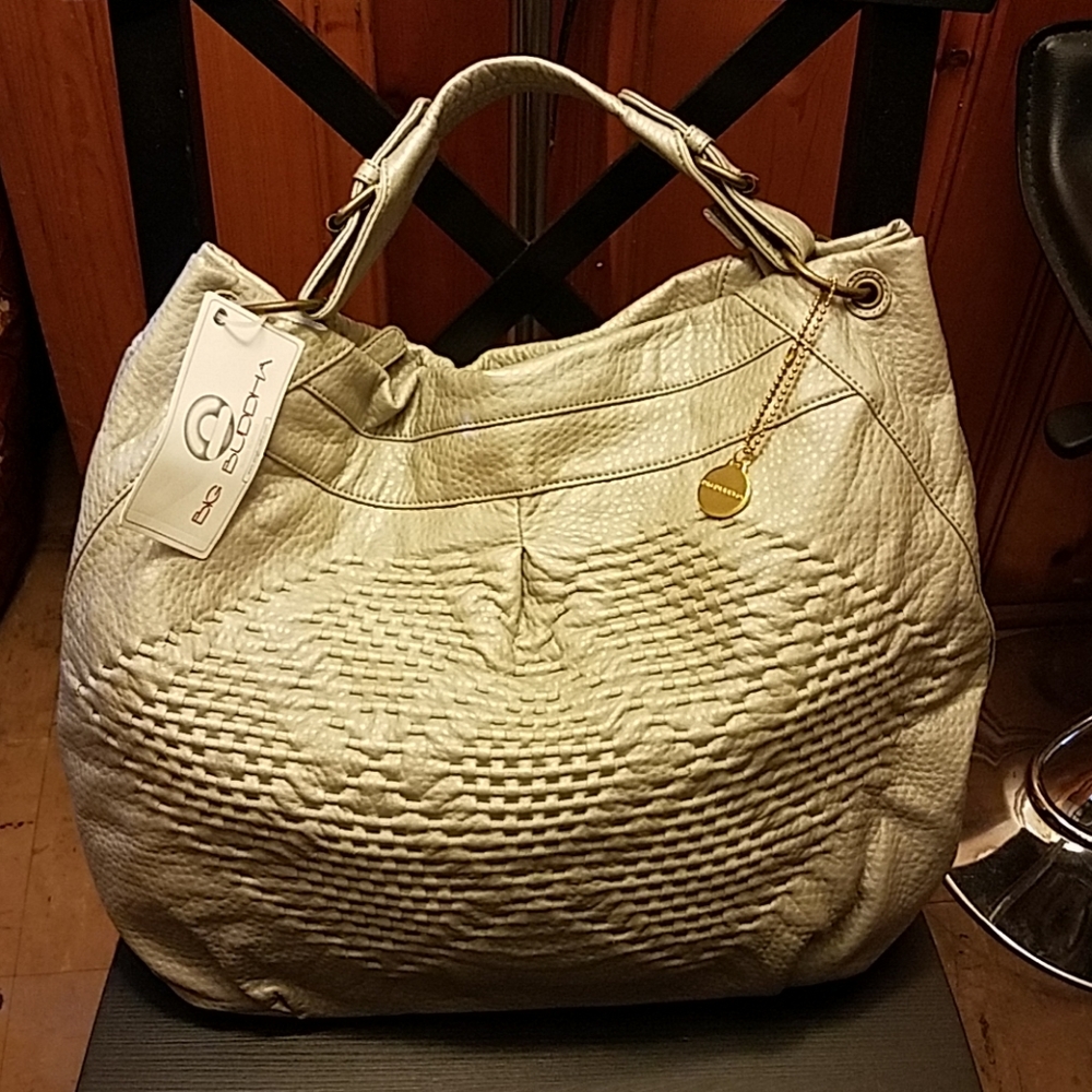 Brand new. Tags attached.  Big Buddha purse!
